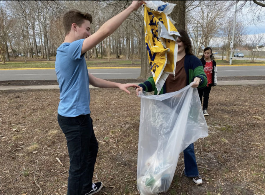 Senior Tallon Cummings-Watson cleans up trash for an advisory service project on Feb. 15, 2023.