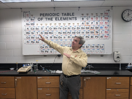 Chemistry teacher Donald Robertson refers to the periodic table almost every day, even after class. Pictured here is Robertson after class, on Feb. 9, 2023. 