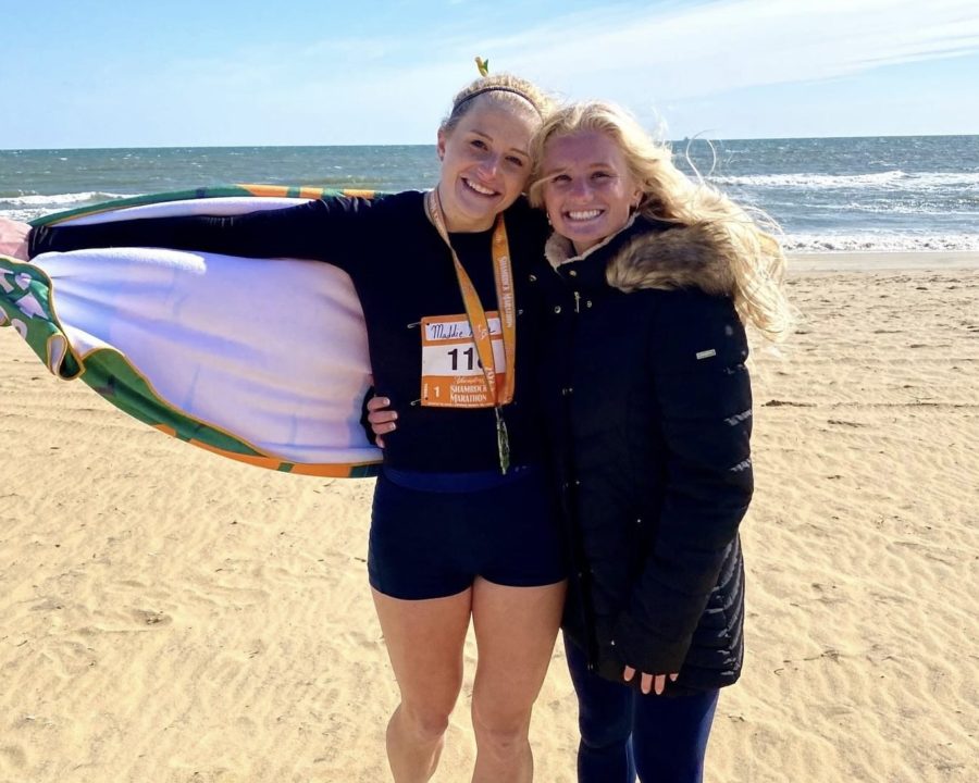 Madeleine King celebrates moments after victory on the beach with sister Meredith King on March 20, 2023. 