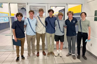 Juniors Ryan Studley, Owen Wilbright, Cannon Robins, Dylan Tamayo, Nick Award, Barrett Scharfe and Caleb Tomberlin are inducted into NHS on April 20, 2023.