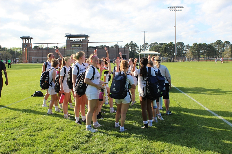 Girls varsity soccer celebrates a 2-1 win against Norfolk Academy on April 4, 2023, at Norfolk Academy.