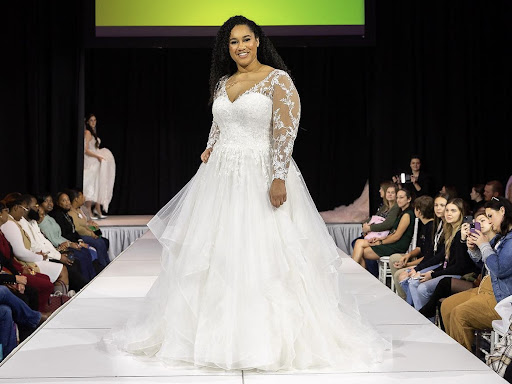 Almuna Lexi Thomas modeling for the Uniquely Your Bridal Show.
