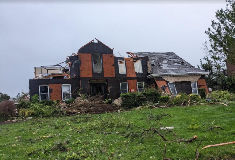 aftermath of tornado causes roof destruction  on April 30, 2023