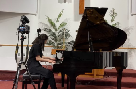 Along with having a passion in the medical field, Anna Luong is a pianist as shown in the picture as she performs at a concert on April 6, 2021.