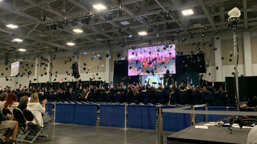 The class of 2023 throw their caps into the air after officially graduating from Ocean Lakes High School on June 17, 2023, at the Convention Center.