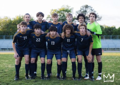 Varsity boys soccer gathers together after a hard fought win against Princess Anne at Cox High School on May 5, 2023.