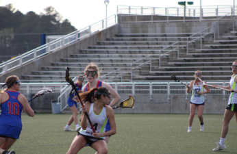 Senior captain Riley Devlin charges toward the goal at the Virginia Beach Sportsplex on March 28, 2023.