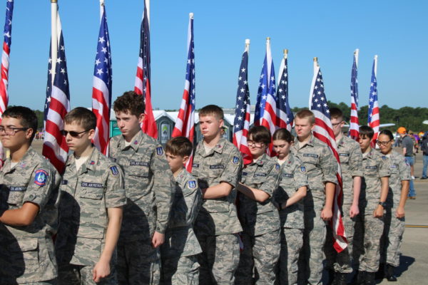Civil Air Patrol cadets get ready to march onto the flight line as flag bearers for the Oceana Air Show’s opening parade on Sept. 16, 2023.