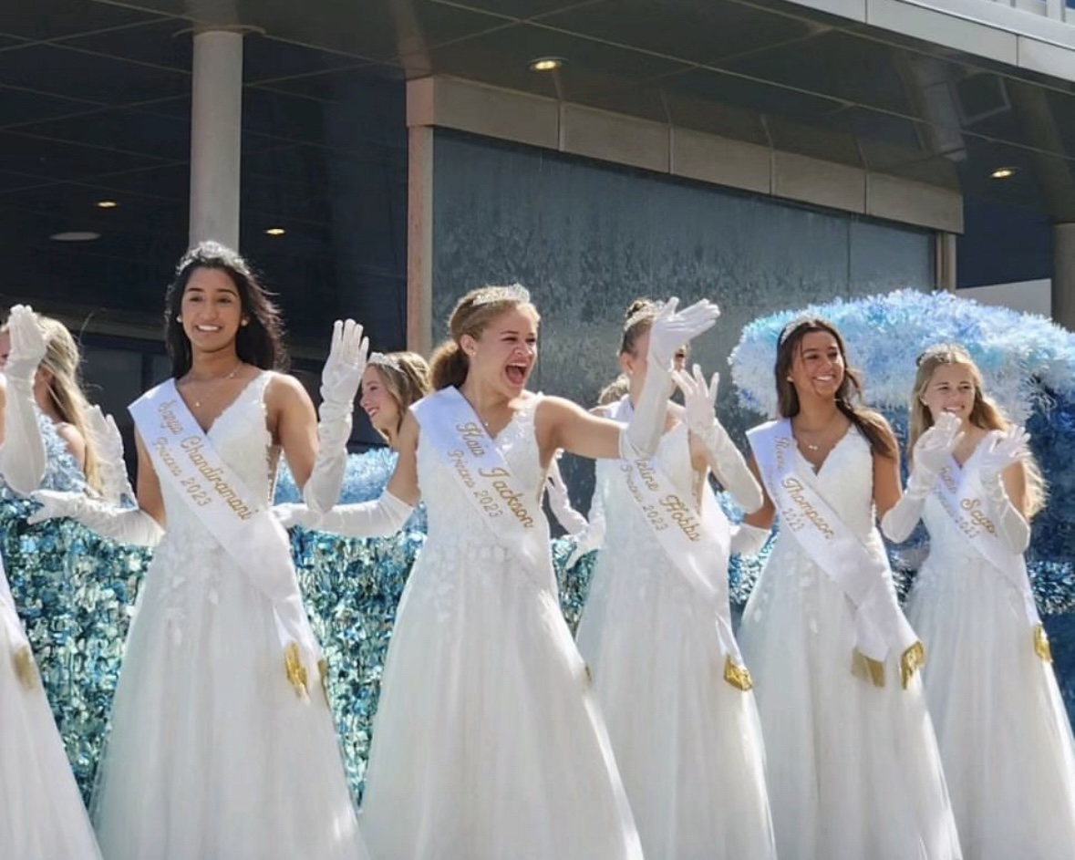 Senior Kaia Jackson (second from left) waves as she represents Ocean Lakes as a Neptune Princess during the Neptune Parade on Sept. 30, on Atlantic Ave. in Virginia Beach, Virginia. Photo used with permission from Kelly Matlock.