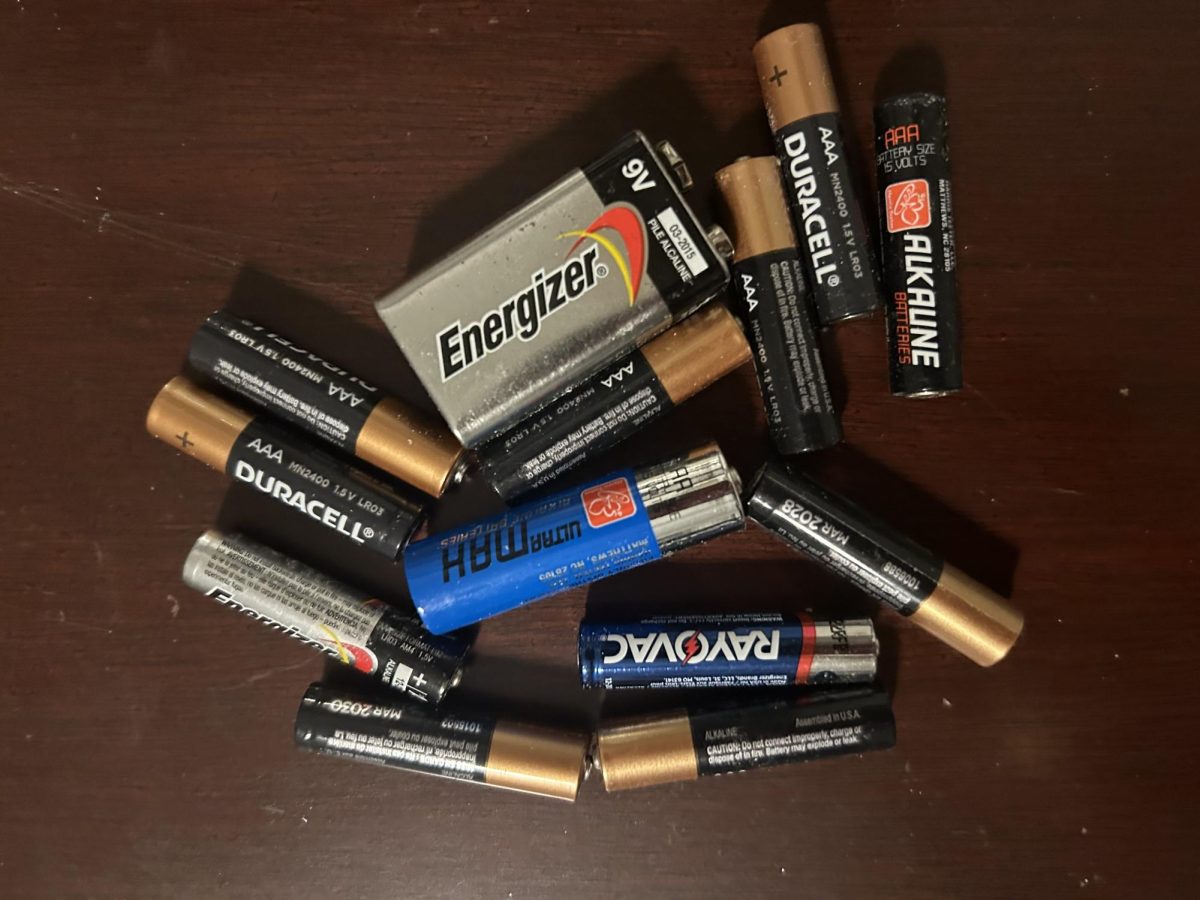 Used batteries sit on a table before going to a recycling center on Nov. 2, 2023.