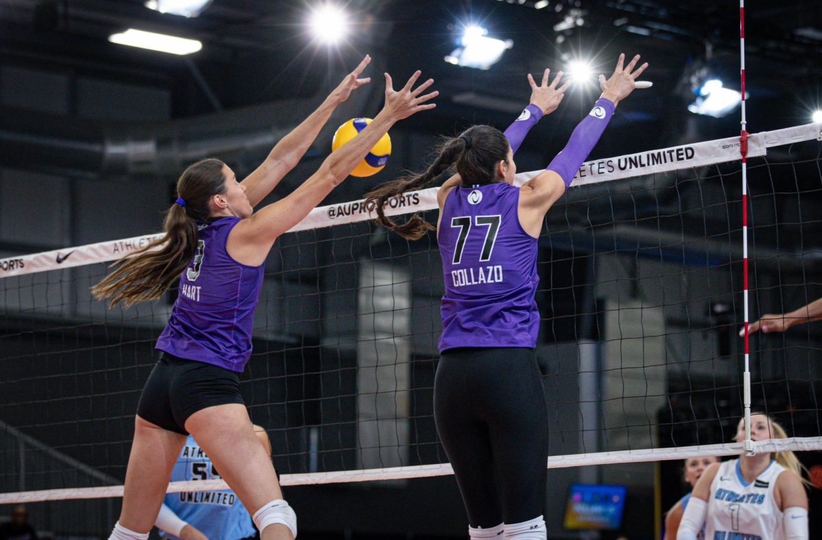 Danielle Hart jumps to block an incoming attack from Team Nootsara in Phoenix AZ, on Oct. 6, 2023. Photo used with permission from Jade Hewitt.