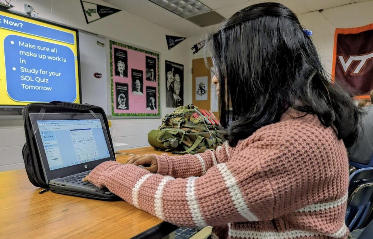 Freshman Tejaswini Attada makes a pass on her Chromebook to use the bathroom in the World History classroom on Oct. 26, 2023. Students are required to do this in addition to asking the teacher’s permission.
