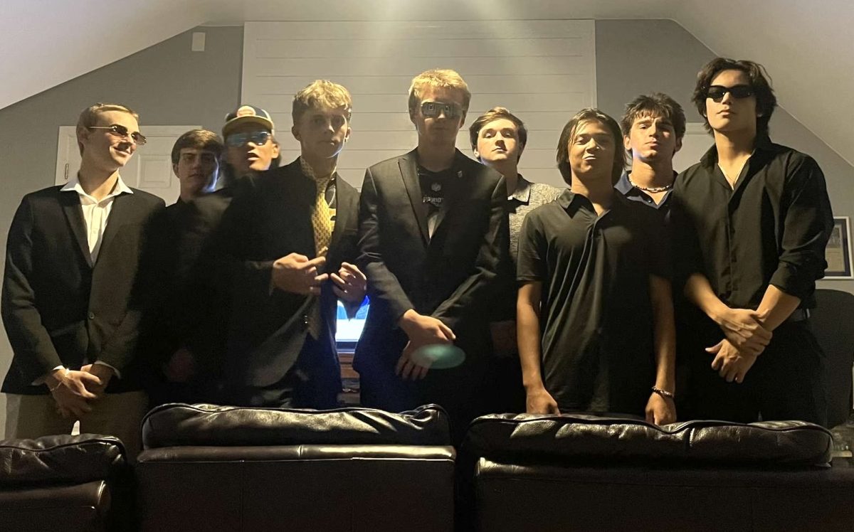 From left to right: Nine Ocean Lakes baseball players: Joey DeBarberie, Sean Burke, Raynor Lizan, Jack Marchesi, James Cummings, Brentlee Powers, Connor Mais, Ben Meneses and Daved Holloway dressed to impress ahead of their annual fantasy football draft. Photo used with permission from James Cummings.