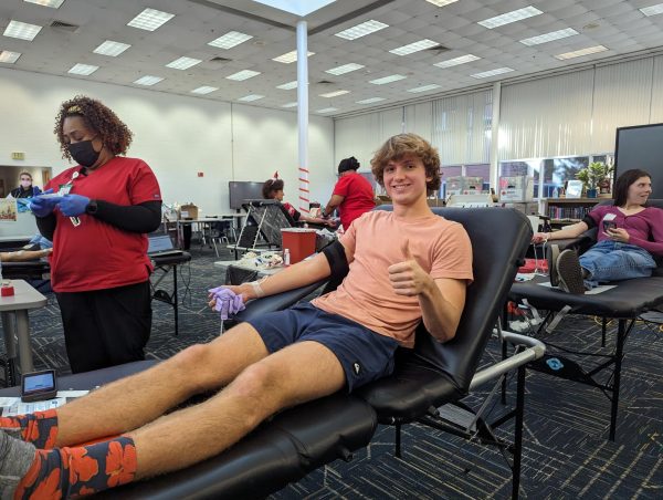 Jack Hancock gets his blood drawn at the National Honor Society blood drive on Dec. 19, 2023.