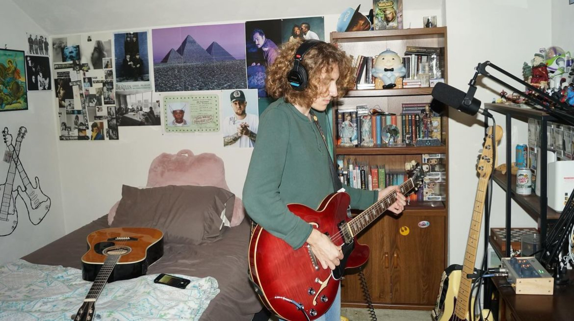 Senior John Newell practices music on his electric guitar in his room on Dec. 5, 2023. Photo used with permission from Bonnie Clyde. 

