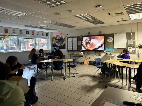 Hollyanne Chestnut’s Honors English 10 class watches the movie Fahrenheit 451 based on the book by Ray Bradbury on January 14, 2024.	