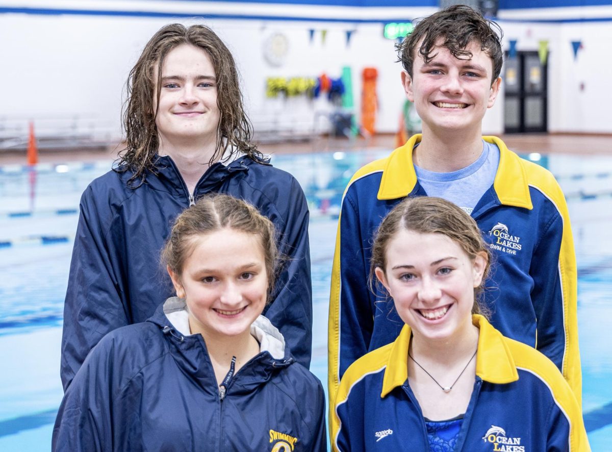 The team smiles after a dive meet on Jan. 12, 2024. Bottom left to right: Maggie Sokalzuk and MaKenna McGrath. Top left to right: Dylan Bennington and Patrick Kinser. Photo used with permission from David Bostic.