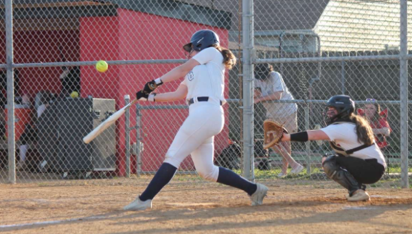 Freshman Ipper Smith swings at the softball game against Salem at Salem High School on March 14, 2024. Ipper’s walk up song is “Let’s Groove,” by Earth, Wind, and Fire. Photo used with permission from Olivia Cirillo.
