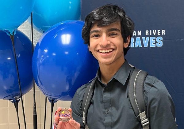 Sophomore Arjun Padiyar proudly holds his  fifth place medal at the 2024 Forensics State Tournament. Photo used with permission from Kim Bedinger. 
