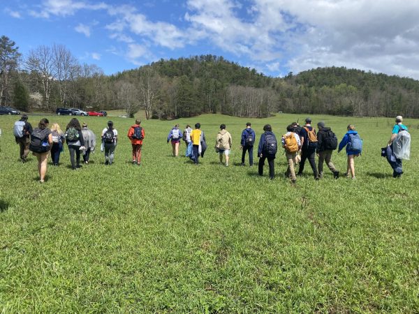 Students and teachers continue their five mile hike in Cades Cove on April 11, 2024. Open fields like this were often littered with wild turkeys. 
