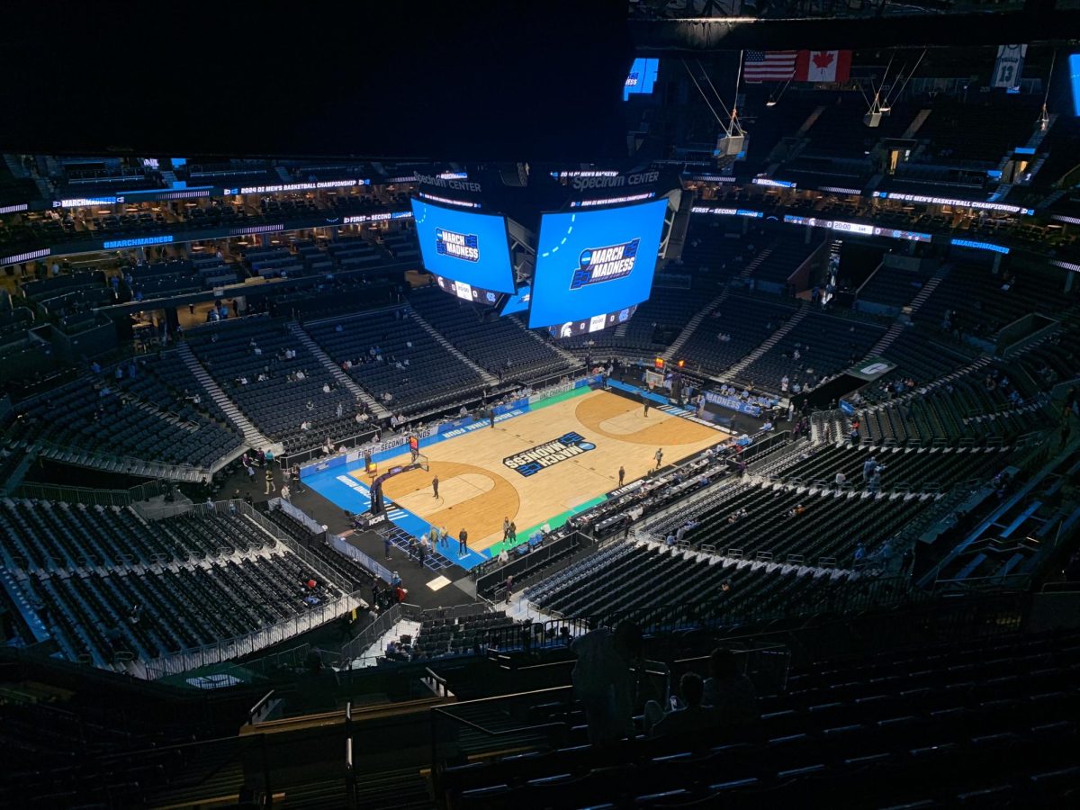 Fans begin to file into Spectrum Center in Charlotte, NC before a second round March Madness game between the North Carolina Tar Heels and Michigan State Spartans. The NCAA makes more than $1 billion in profit each year from the March Madness tournament. 