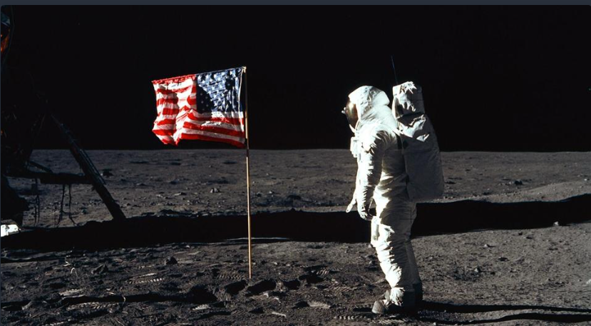 American astronaut Buzz Aldrin salutes the American flag during the Apollo 11 mission to the moon on July 20, 1969. Despite no stars, this picture proves the moon landing was real. Photo taken by Neil Armstrong. 