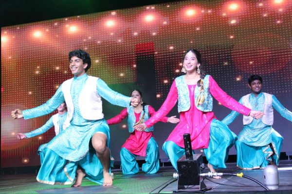 (Left to right): senior Revanth Renukunta, senior Esha Singh, junior Urvi Jain and senior Nimish Nookala celebrate their culture at “Taste of India” on April 20, 2024. The group performed a folk dance from the Punjab region of India called the bhangra.