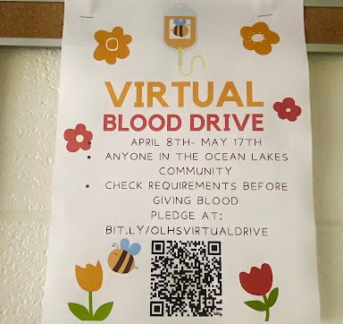 An NHS poster in front of the courtyard doors at Ocean Lakes High School on April 23, 2024, shares the news of a virtual blood drive held from April 8 to May 12 for the Ocean Lakes Community. Blood drives help many patients and the local community. 
