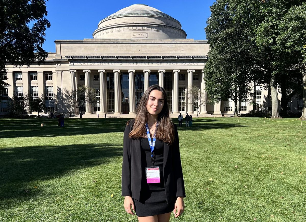 Senior Ralitsa Hovanessian stands in front of the MIT campus in Cambridge, Mass. on Oct. 23, 2023. Sophomore Nathan He, junior Rockwell Li and Hovanessian were invited to present their research project at MITs Undergraduate Research and Technology Conference. Photo used with permission from Ralitsa Hovanessian.