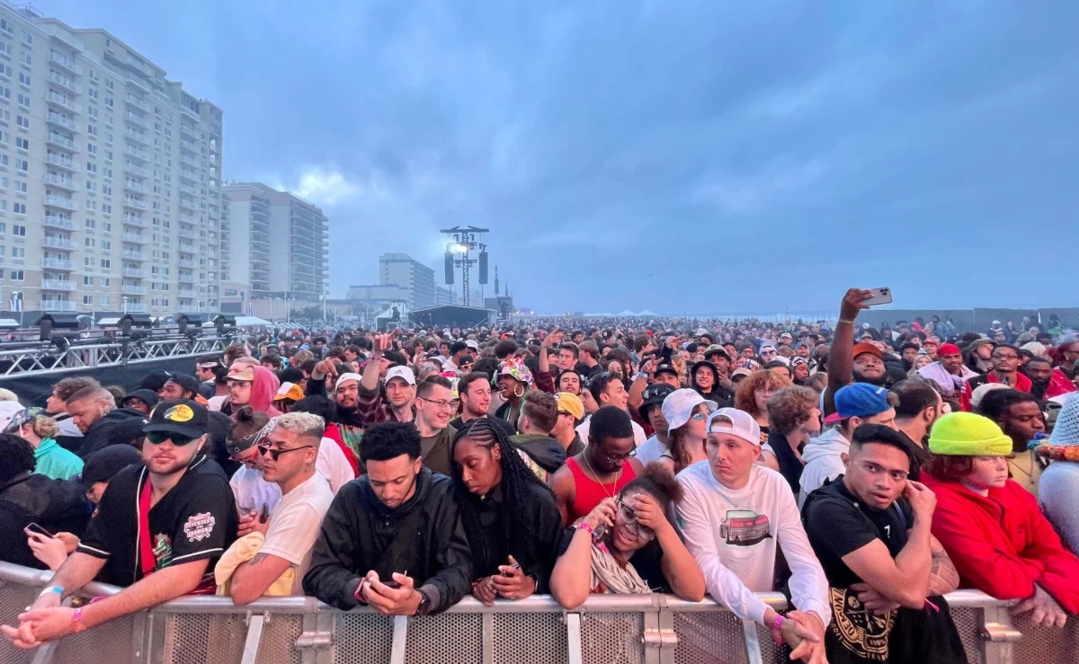 Previous Something in the Water festival-goers eagerly await the beginning of another performer’s set at the 2022 festival. The event, which has traditionally been held in the spring, has often had challenges with weather. Photo used with permission from Mike Diller.