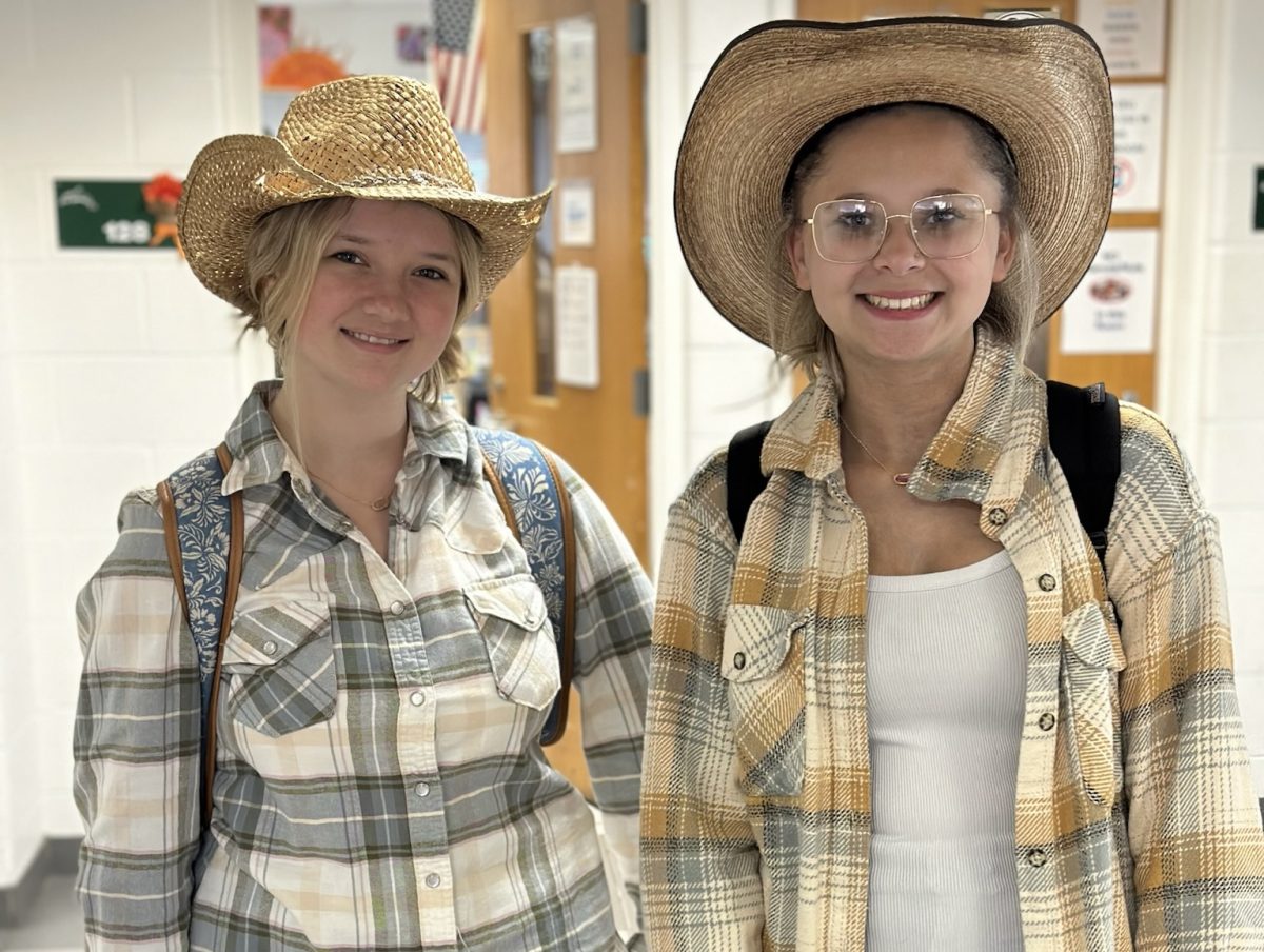 Freshmen Maya Phillips and Aimree Szczepanski show off their country attire in the English hallway on Oct. 24, 2024. This was the last spirit day before the grade-level color war and spirit assembly on Friday.