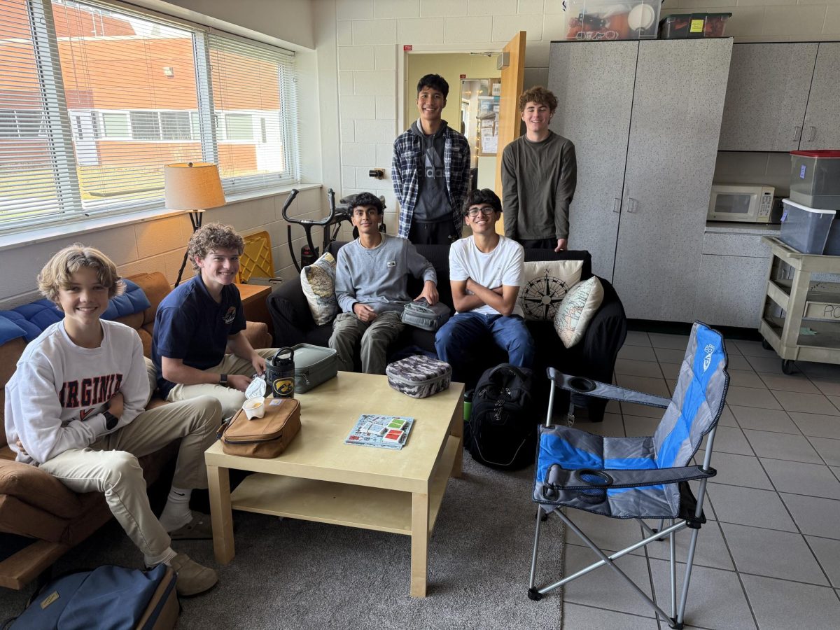 From left to right, sophomores Levi Pearson, Zachary Waterman, Smit Kothari,  Jamison Gutierrez, Vihaan Shah and Stone Wagner attend club meeting in Room 121 on Nov. 19, 2024.