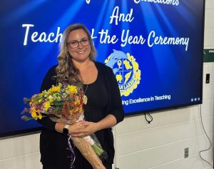 Christina Barnhart received her 2026 Ocean Lakes High School Teacher of the Year award on Oct. 21, 2024 in the Schola at Ocean Lakes High School. Distinguished teacher candidates for the award included math teacher Jack Bayliss, Latin teacher Shirley Hall and English teacher Fara Wiles.