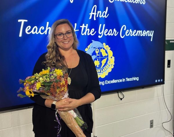 Christina Barnhart received her 2026 Ocean Lakes High School Teacher of the Year award on Oct. 21, 2024 in the Schola at Ocean Lakes High School. Distinguished teacher candidates for the award included math teacher Jack Bayliss, Latin teacher Shirley Hall and English teacher Fara Wiles.