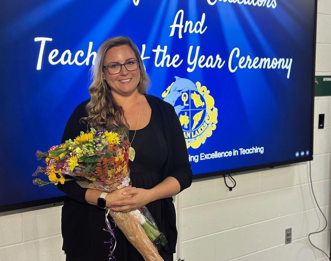 Christina Barnhart received her 2026 Ocean Lakes High School Teacher of the Year award on Oct. 21, 2024 in the Schola. Runner-up candidates for the award included math teacher Jack Bayliss, Latin teacher Shirley Hall and English teacher Fara Wiles.