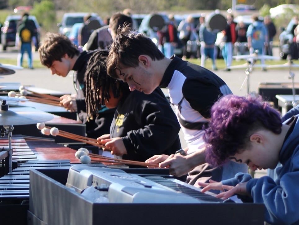 Indoor percussion performs during the Atlantic Indoor Association’s finals at the Hampton Coliseum on April 7, 2024. The team placed fourth out of around 20 schools. Photo used with permission from Caitie Corella.