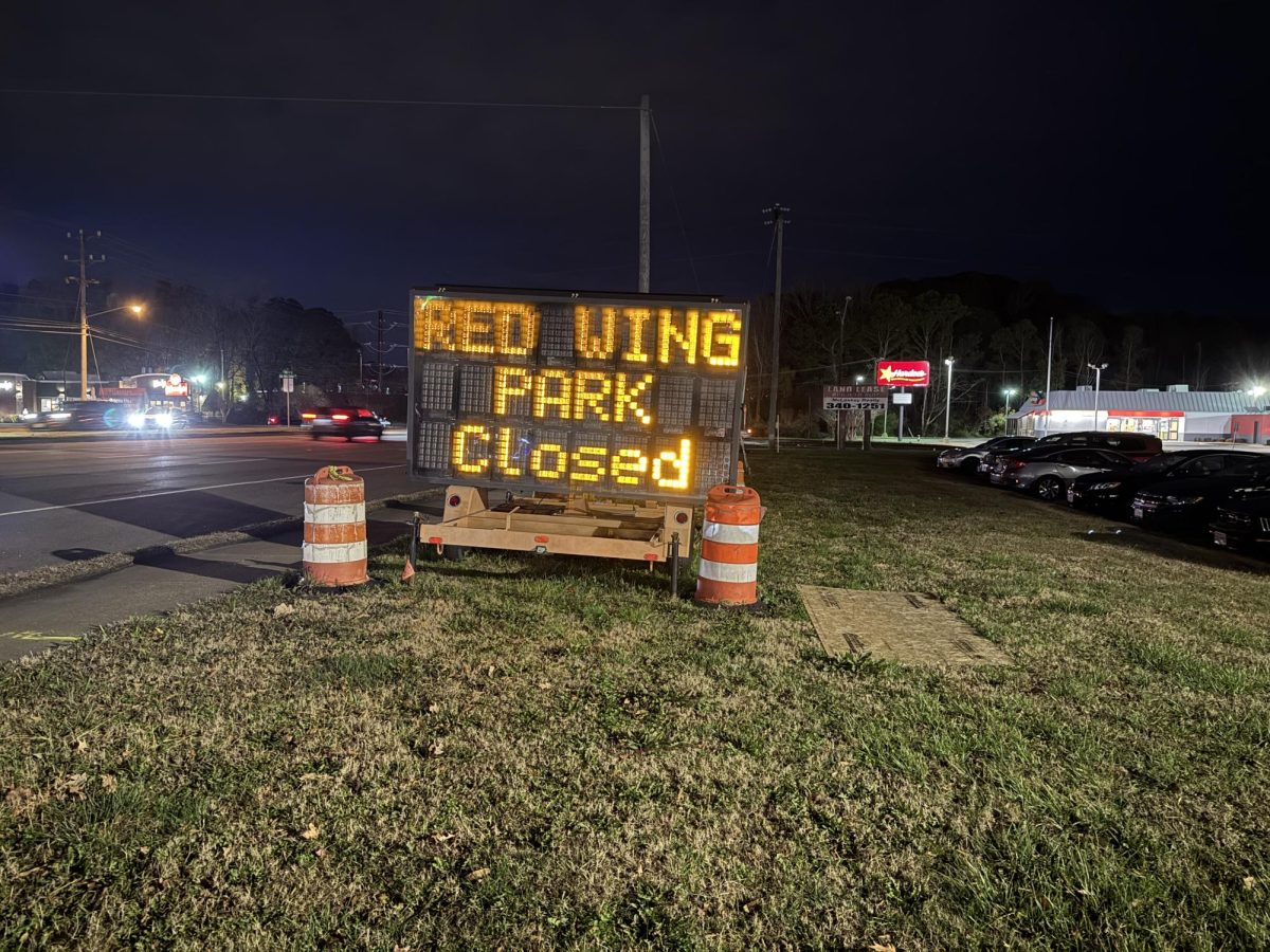 A sign near Chick-fil-A on General Booth Boulevard informs the public about Red Wing Park's closure and shows when it is expected to open. This picture was taken on Dec. 19, 2024.