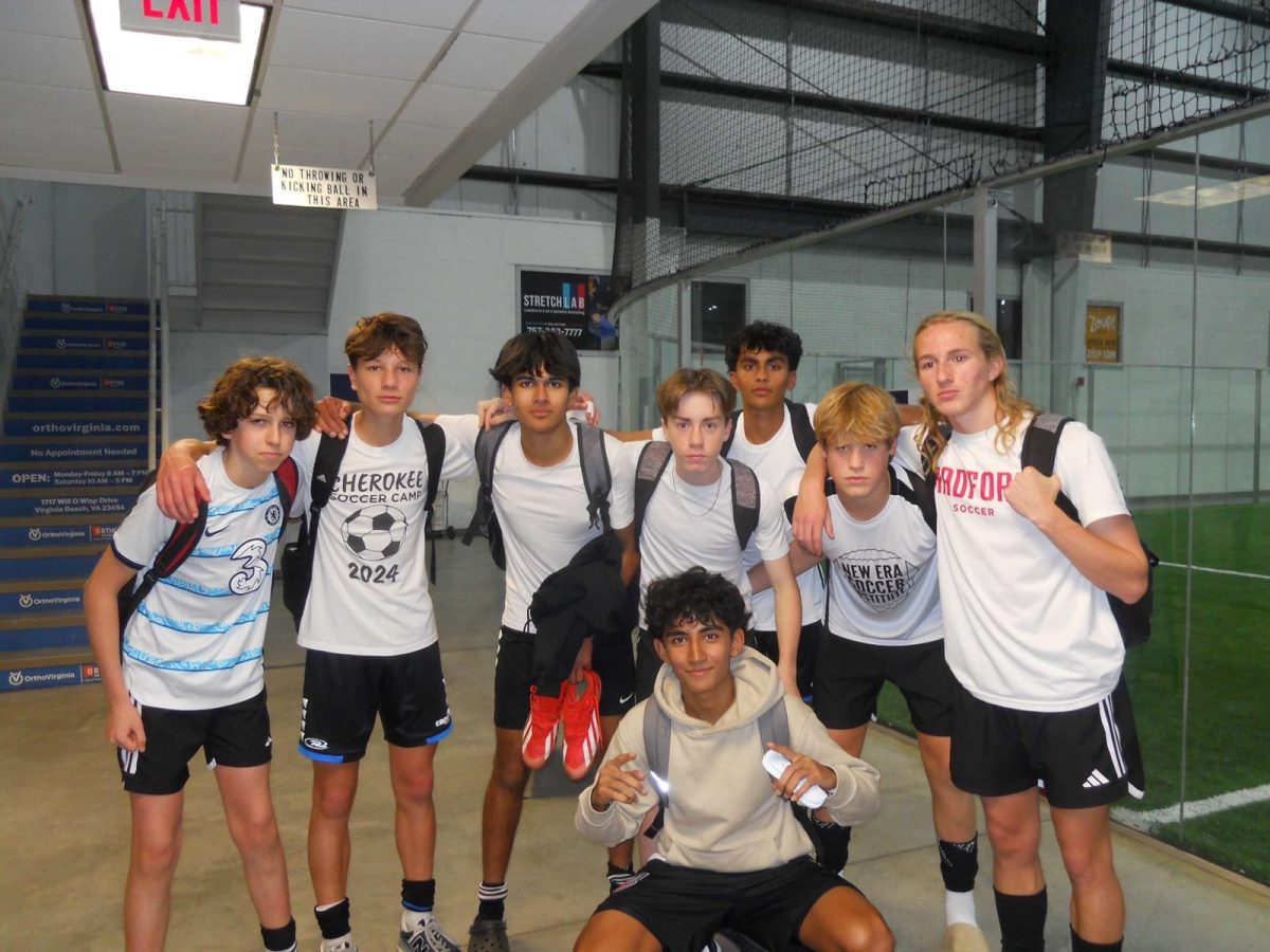 From left to right: sophomores Rowan Smith, Tristan Domanski, Vihaan Shah, Michael Blackmore, Smit Kothari, Drew Halter, Van Helgren and Bisaj Shrestha on  the bottom, take a group picture after a game at the Virginia Beach Field House on Jan. 25, 2025. The Crushers are an off-season team designed for OL sophomores to improve their skills. Photo used with permission of Drew Halter. 