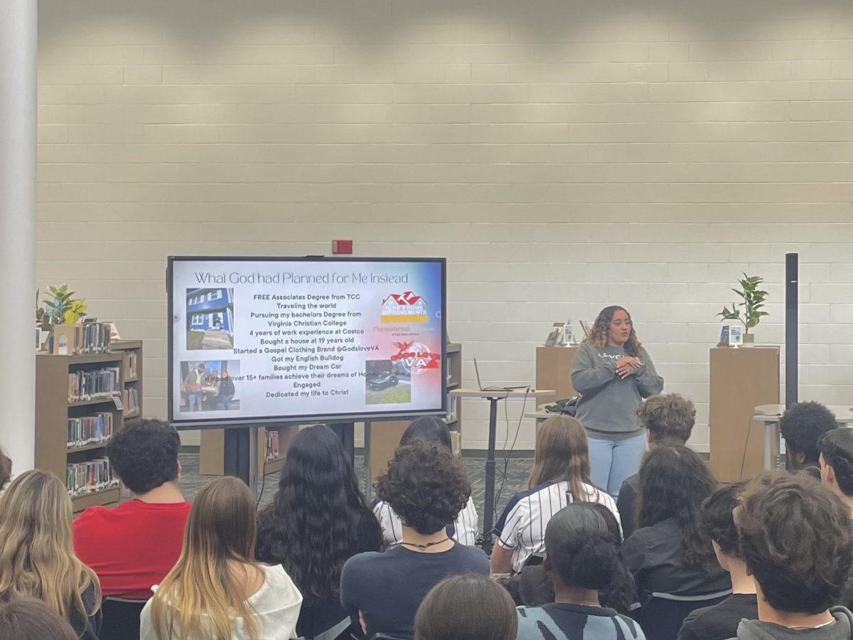 Alumna Brianna Reynolds '20 presents on her time at Ocean Lakes, and life after graduating. Her presentation, titled "2020 Vision" was held in the library on Mar. 6, 2025 during third block. Photo used with permission from Kyle Acre.