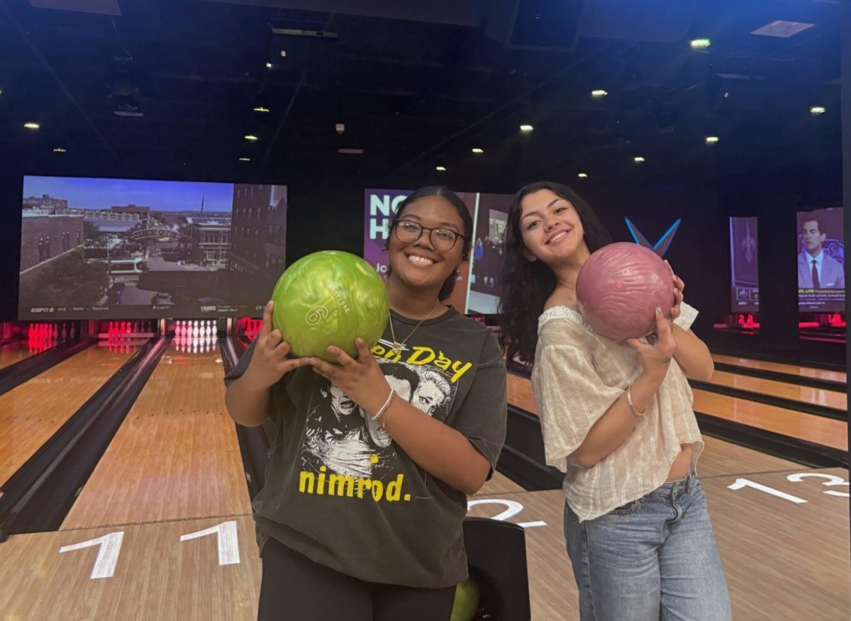 From left: seniors Tajyhia Manuel and Grace Melendez participate in the Gradfest 2025 preview for Ocean Lakes on April 25, 2025 at Apex Entertainment. Bowling will be available to all participants at Gradfest.