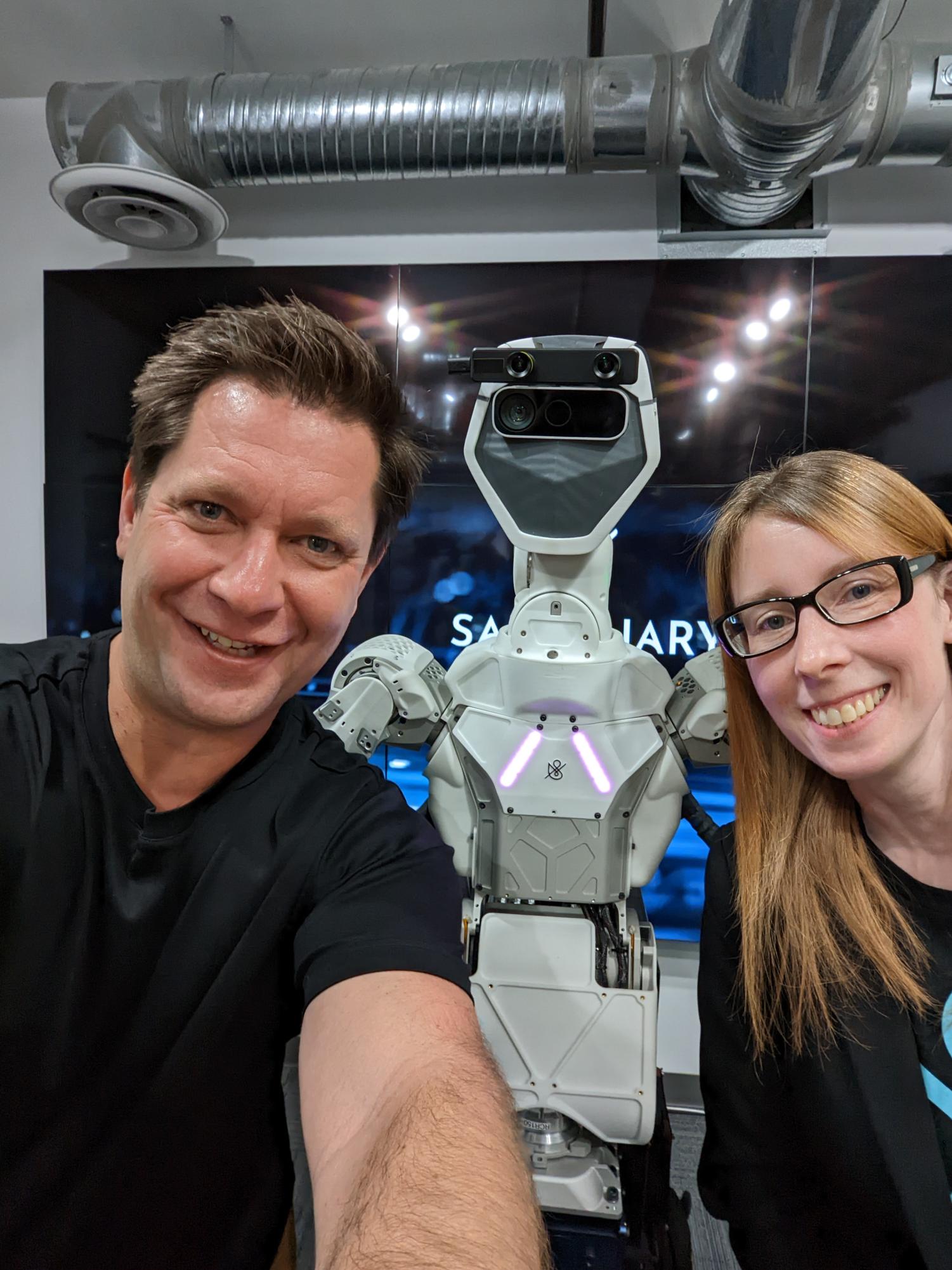 Ashlee Vance takes a selfie with a friend and a mechanical apparatus in Vancouver, Canada on April 5, 2022. He works closely with a tight-knit team to develop documentaries and educational videos. Photo used with permission from Ashlee Vance.