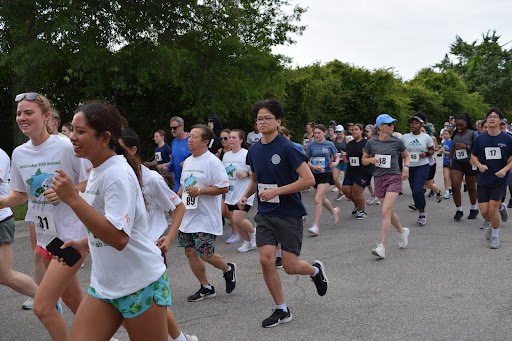 Dolphin Dash 5K participants begin their race in the Ocean Lakes student parking lot on May 17, 2025. Photo used with permission from Kaydyn Ismail.
