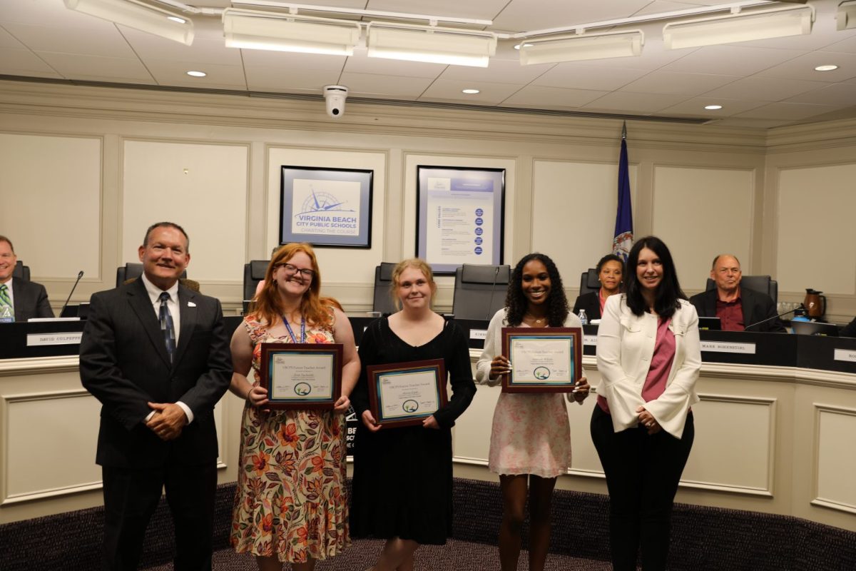 From left: Superintendent Dr. Donald Robertson, seniors Erin Tucholski, Alyssa Eagen, junior Samyah Wilson and School Board Chair Kathleen Vice officially signed their contracts with Virginia Beach City Public Schools (VBCPS) on May 14, 2025. These students, along with seniors Thomas Dillard and Marlie Smith earned the teaching contract with VBCPS. Photo courtesy of VBCPS.