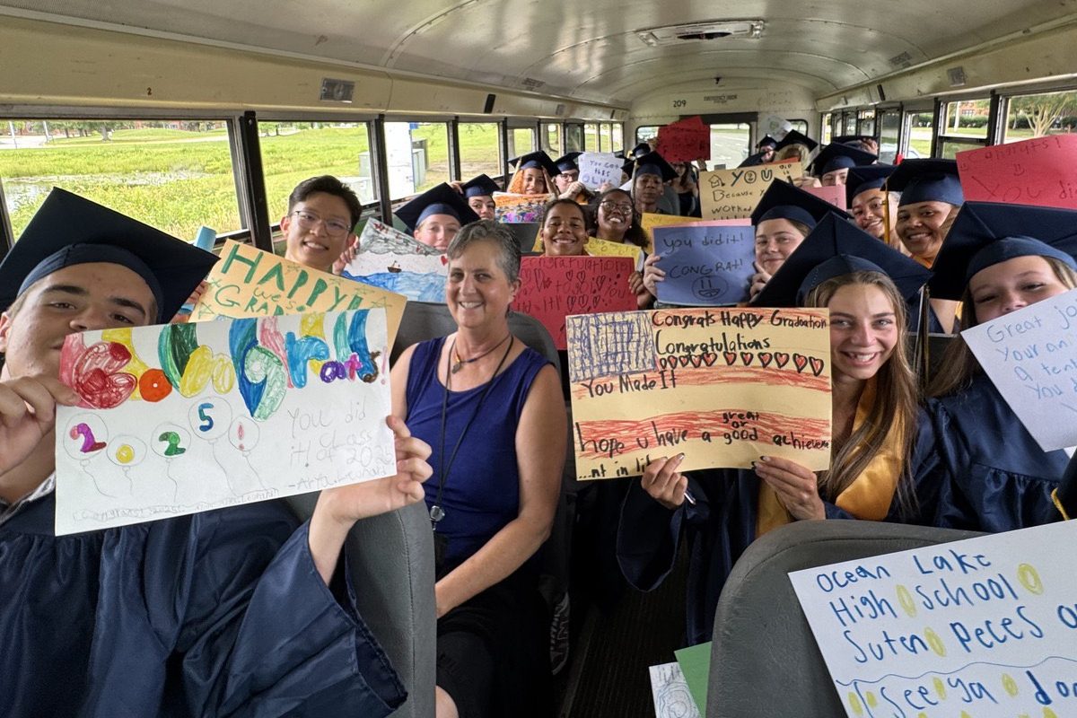 Ocean Lakes Class of 2025 students who attended Ocean Lakes Elementary School smile on the bus after receiving cards from the elementary school students on June 5, 2025 at Ocean Lakes Elementary School. Photo used with permission from Michele Clark.
