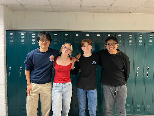 From left to right President Robinson Chen, Vice President Anna Daubenspeck, Secretary Keagan Hall, Treasurer Henry Nguyen. 
Ocean Lakes newest SCA officers for the 2025, 2026 school year embrace each other eager to continue the dolphin way on June 3, 2025.
