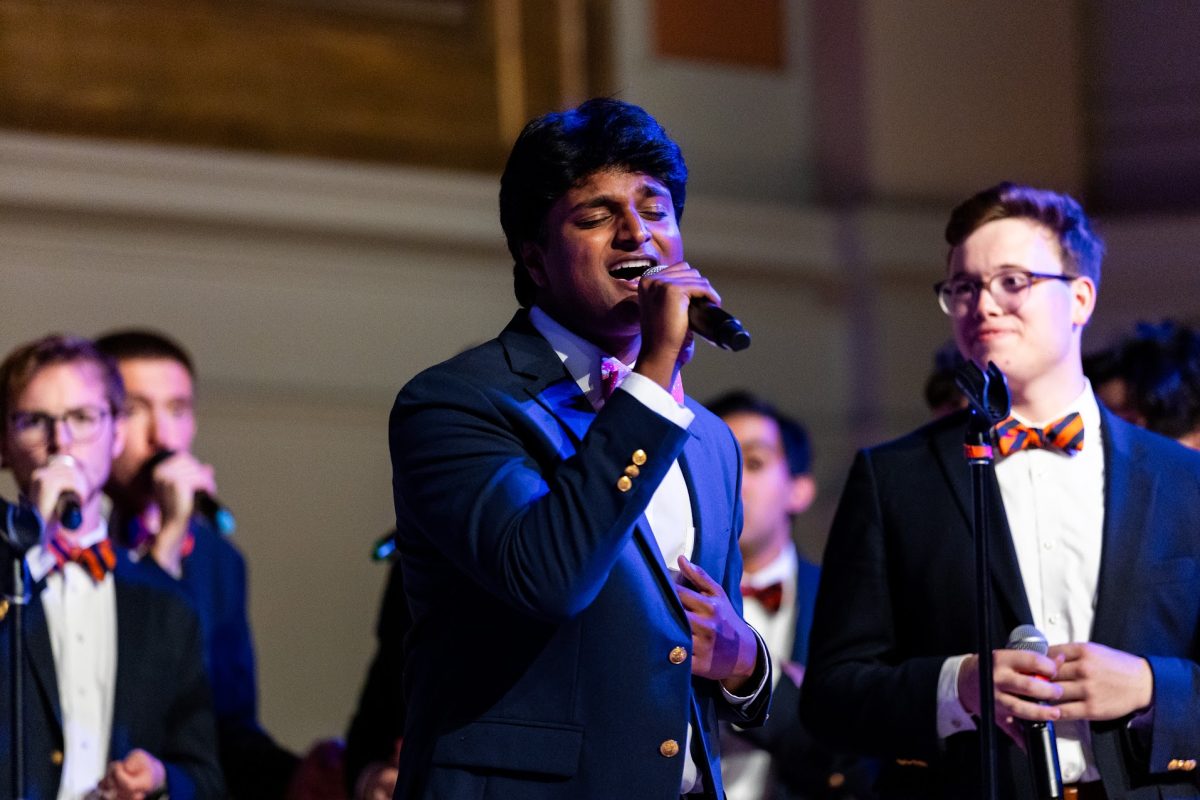 Nimish Nookala '24 sings a solo during the Virginia Gentlemen's 2025 Spring Classic Concert on Apr. 17, 2025, as president Cavan Meade (right) looks on. The VGs performed an original cover of Speechless by Dan + Shay at UVA. Photo used with permission from Nimish Nookala.