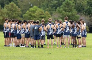 Boys cross country comes together before the RVA Relays in Mechanicsville, Va. on Sept. 13, 2025. The team started off hot, ranking second in Class 5 Region A. Photo used with permission from Christine Rakov.