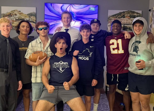 From left, Ocean Lakes baseball players and current seniors Mitchel Byers, Connor Mais, Aidan Benson and Ben Meneses, alumni Rowan Powers, junior Zach Waterman, alumni Brentlee Powers, senior Treymaine Pleasant-Massey, and alumni Ryan Gocio gather for a Fantasy Football draft on September 15, 2024. The baseball team runs a Fantasy Football league every year. Photo courtesy of Brentlee Powers. 