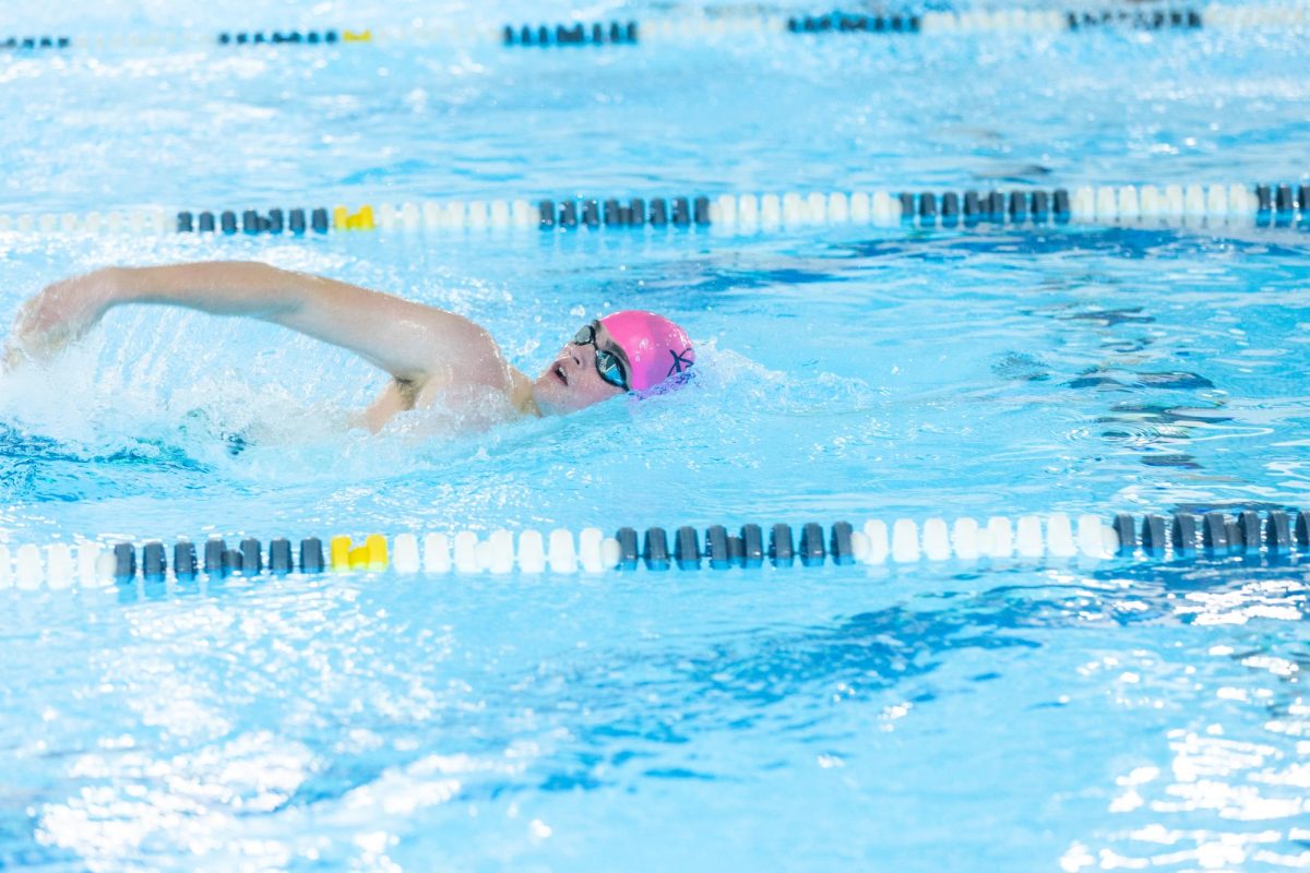 Sophomore Cormac Worrall swims the 400-meter freestyle race at the Class 5A regional championships. The boys swim team placed seventh at the regional meet. Photo used with permission from David Bostic. 