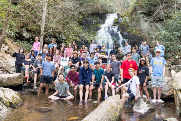 Students and teachers pose for the annual group photo at Spruce Flats Falls. The group hiked there on their last day, just prior to returning home. Photo used via permission from David Bostic.
